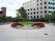 Landscaped community courtyard with circular seating at 1625 Larimer St # 1001, Denver, CO 80202