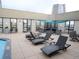 Relaxing rooftop lounge area with comfortable seating and shade, perfect for entertaining guests at 1625 Larimer St # 1001, Denver, CO 80202