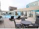 Well-maintained rooftop pool deck featuring comfortable seating and a pristine pool at 1625 Larimer St # 1001, Denver, CO 80202