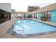 Rooftop pool with lounge chairs, offering a relaxing outdoor space with city views at 1625 Larimer St # 1001, Denver, CO 80202