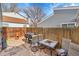 A cozy backyard with a patio, seating, and barbecue grill at 16403 E Radcliff Pl # A, Aurora, CO 80015