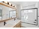 Main bathroom with double vanity and shower/tub at 21792 Silver Meadow Ln, Parker, CO 80138