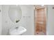 Basement bathroom with a pedestal sink and shower at 21792 Silver Meadow Ln, Parker, CO 80138