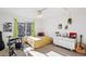 Bright bedroom with window and ceiling fan at 21792 Silver Meadow Ln, Parker, CO 80138