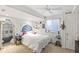 Basement bedroom with a full-size bed and ceiling fan at 21792 Silver Meadow Ln, Parker, CO 80138