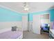 Light blue bedroom with built-in shelving and a daybed at 21792 Silver Meadow Ln, Parker, CO 80138