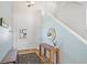 Bright entryway with wood floors and bench at 21792 Silver Meadow Ln, Parker, CO 80138