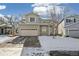 Two-story house with attached garage, inviting curb appeal at 21792 Silver Meadow Ln, Parker, CO 80138