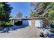 Spacious home with a two-car garage and a well-maintained concrete driveway at 3561 Kalispell St, Aurora, CO 80011