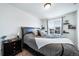 Spacious bedroom featuring a comfortable bed and window views at 5385 Walden Ct, Denver, CO 80249