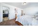 Bedroom with a view into the bathroom at 5385 Walden Ct, Denver, CO 80249