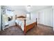 Spacious bedroom with king-size bed and large windows at 5385 Walden Ct, Denver, CO 80249