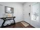 Bright entryway with console table and mirror at 5385 Walden Ct, Denver, CO 80249