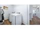 Convenient laundry room with washer and dryer at 5385 Walden Ct, Denver, CO 80249