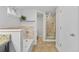 Bathroom featuring tiled shower and floors, toilet, and granite vanity at 3334 W 37Th Ave, Denver, CO 80211