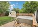 Backyard features a patio with a hot tub and a shed at 7075 Welch Ct, Arvada, CO 80004