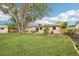 Well-manicured backyard featuring a patio set and a shed at 7075 Welch Ct, Arvada, CO 80004