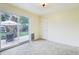 Bright dining area featuring a sliding glass door to a patio and backyard at 7075 Welch Ct, Arvada, CO 80004