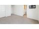 Carpeted bedroom with walk in closet and attached bath at 5682 N Galena St, Denver, CO 80238