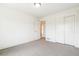 Cozy bedroom with closet and doorway leading to the hallway at 5682 N Galena St, Denver, CO 80238