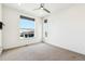 Bright bedroom with large windows and ceiling fan at 5682 N Galena St, Denver, CO 80238