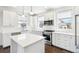 Modern kitchen with stainless steel appliances and quartz countertops at 5682 N Galena St, Denver, CO 80238