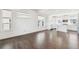 Bright living space with large windows and a combined kitchen and dining area at 5682 N Galena St, Denver, CO 80238