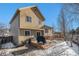 Exterior view of the home's spacious deck with backyard and lawn at 11083 Quail Ct, Parker, CO 80134