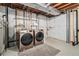 Unfinished basement with new Samsung washer and dryer at 11083 Quail Ct, Parker, CO 80134