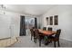 Formal dining room with carpet, natural light and seating for six at 11083 Quail Ct, Parker, CO 80134