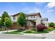 Contemporary home with a landscaped front yard, a combination of beige and brown exterior, and a welcoming entrance at 17258 E 109Th Ave, Commerce City, CO 80022