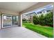 View from the covered patio to the landscaped backyard of this suburban home at 17258 E 109Th Ave, Commerce City, CO 80022