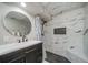 Bathroom featuring a tiled walk-in shower and updated vanity at 18159 E Crestline Cir, Centennial, CO 80015