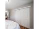 Bedroom with closet and door leading into another room at 18159 E Crestline Cir, Centennial, CO 80015