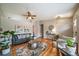 Bright living room with hardwood floors, comfortable sofa, and stylish decor at 18159 E Crestline Cir, Centennial, CO 80015