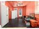 Open room with ceiling fan, great for dining or storage, awaiting your creative ideas and refurbishments at 2410 W 36Th Ave, Denver, CO 80211