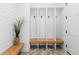 Functional mudroom with built-in bench and hooks at 8006 S Settlers Dr, Morrison, CO 80465