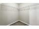 Walk-in closet with wall-mounted wire shelving for optimal storage at 12554 Hudson Ct, Thornton, CO 80241