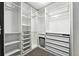 Large walk-in closet featuring custom shelving and plenty of space at 12554 Hudson Ct, Thornton, CO 80241