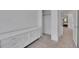 A carpeted bedroom featuring a dresser, closet, and natural light, creating a bright and comfortable living space at 1726 N Lafayette St, Denver, CO 80218