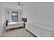 Bright bedroom with a cozy bed, dresser, and ample natural light, perfect for rest and relaxation at 1726 N Lafayette St, Denver, CO 80218