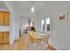 Dining area with table, chairs, and lots of light at 1726 N Lafayette St, Denver, CO 80218