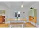 Light-filled dining area with modern furnishings and natural light at 1726 N Lafayette St, Denver, CO 80218