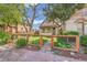 Charming home features a well-manicured front yard, complemented by a stylish fence and lush landscaping at 1726 N Lafayette St, Denver, CO 80218