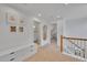 Hallway featuring a white storage unit and views of other living spaces at 1726 N Lafayette St, Denver, CO 80218