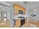 Updated kitchen with stainless steel appliances and custom wood cabinetry at 1726 N Lafayette St, Denver, CO 80218