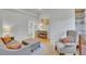 Cozy living room featuring hardwood floors, a seating area and lots of light at 1726 N Lafayette St, Denver, CO 80218
