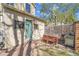 Cozy patio with brick pavers, dining set, gas grill, and exterior door, perfect for outdoor entertaining at 1726 N Lafayette St, Denver, CO 80218
