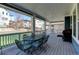 Outdoor patio with a dining table and seating, perfect for enjoying the outdoors at 18315 W 83Rd Dr, Arvada, CO 80007