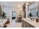 Bathroom featuring a standalone tub, double vanity, and modern finishes at 5668 Shadescale Way, Castle Rock, CO 80104